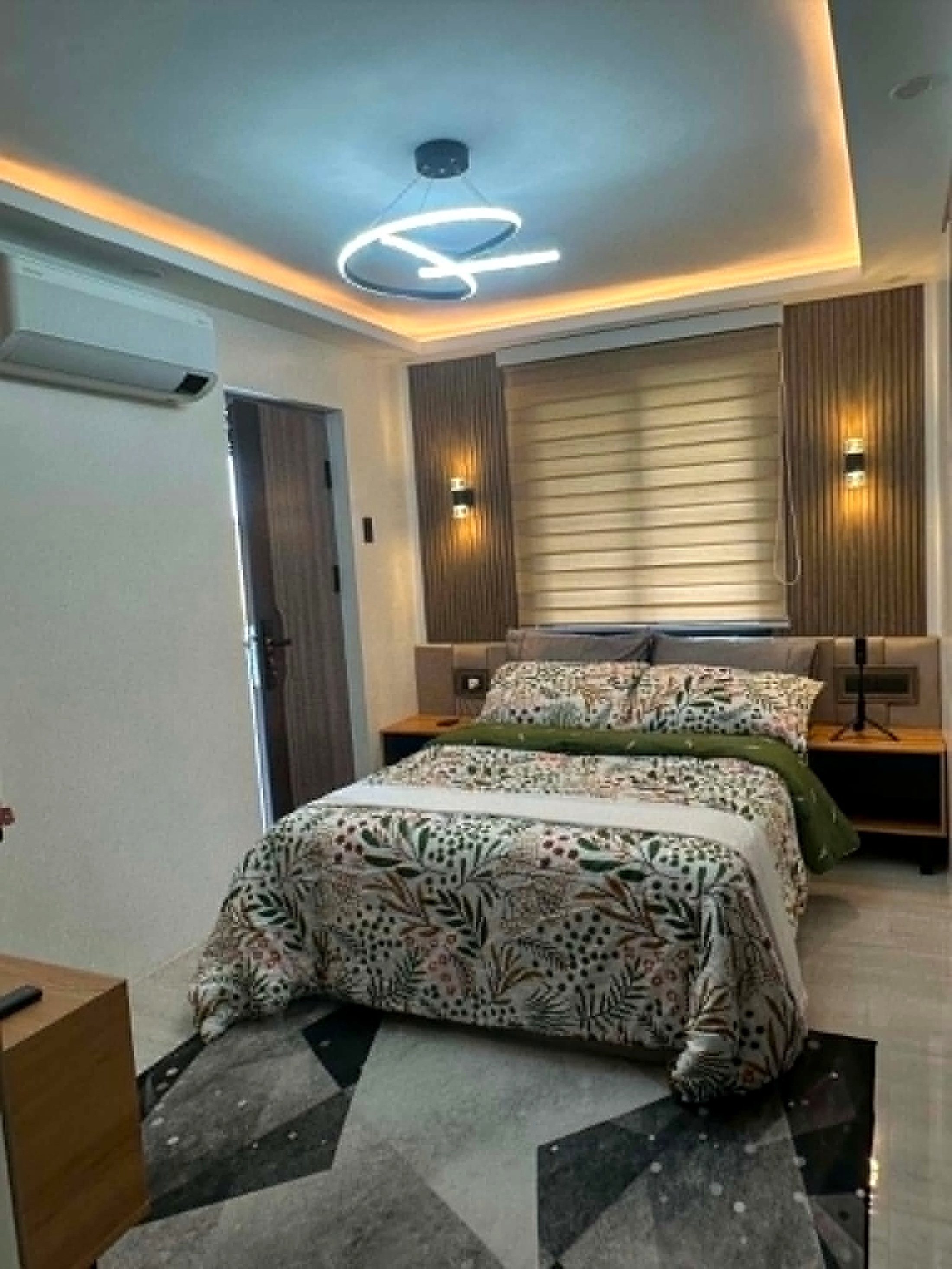 Modern master bedroom with warm lighting
